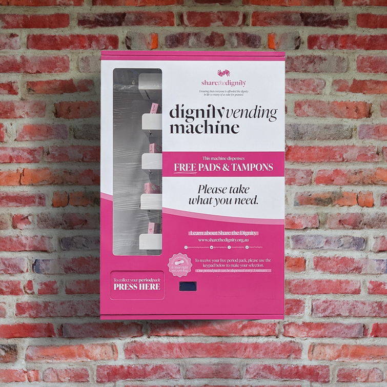 Wall mounted hygiene and consumables vending unit in an Australian workplace amenities area